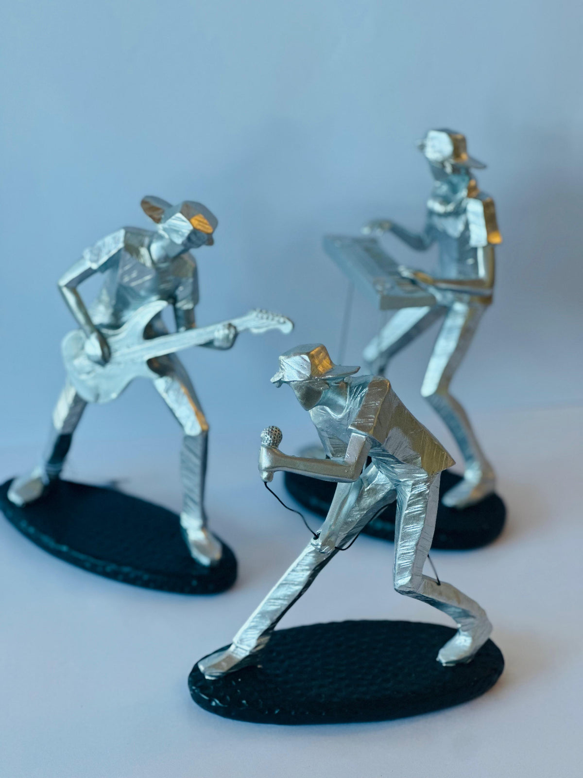 ESCULTURA MÚSICO CANTOR