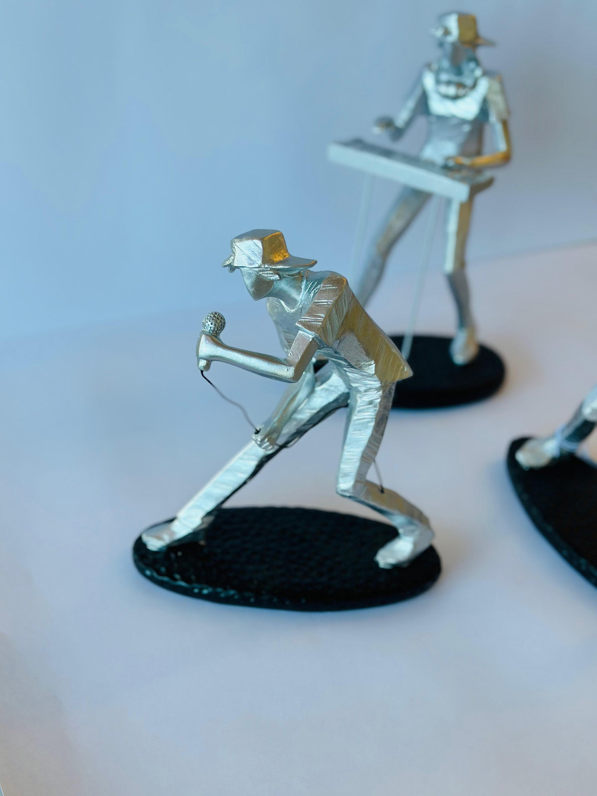 ESCULTURA MÚSICO CANTOR